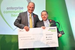 Winner of the National Community Hero Award 2014 Adrian Emmett with winners cheque for £10,000