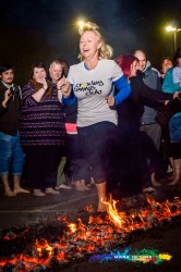 Firewalk for Peace hospice care charity lady walking on hot embers watford mark in time photography events