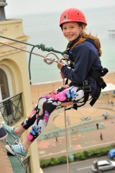 Young girl taking part in charity abseil Mark In Time Photography