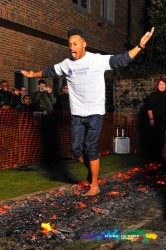 Firewalker walking across hot coals by Mark In Time Photography